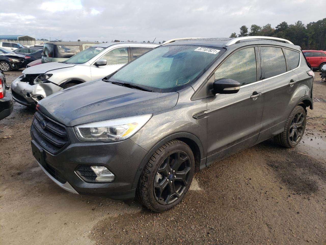 Photo 2 from auction – 2017 FORD ESCAPE TIT with VIN 1FMCU0J96HUD93808