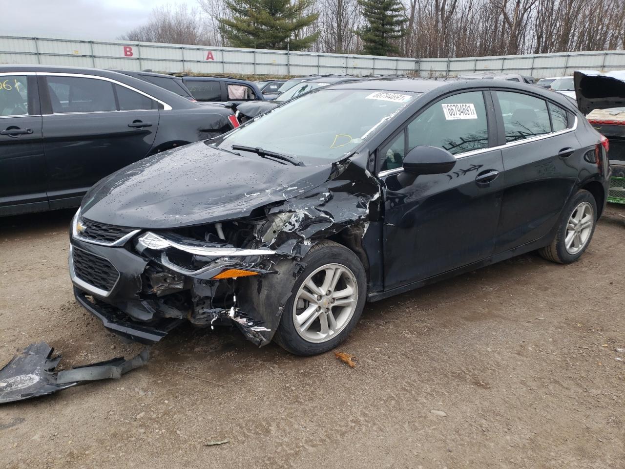 Photo 2 from auction – 2018 CHEVROLET CRUZE LT with VIN 3G1BE6SM4JS520265