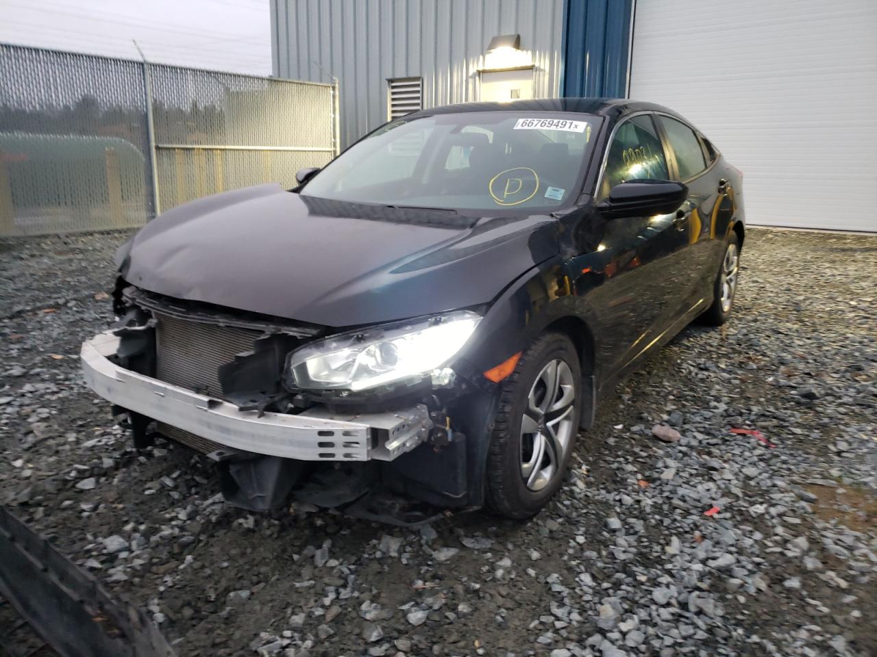 Photo 2 from auction – 2017 HONDA CIVIC LX with VIN 2HGFC2F5XHH040935