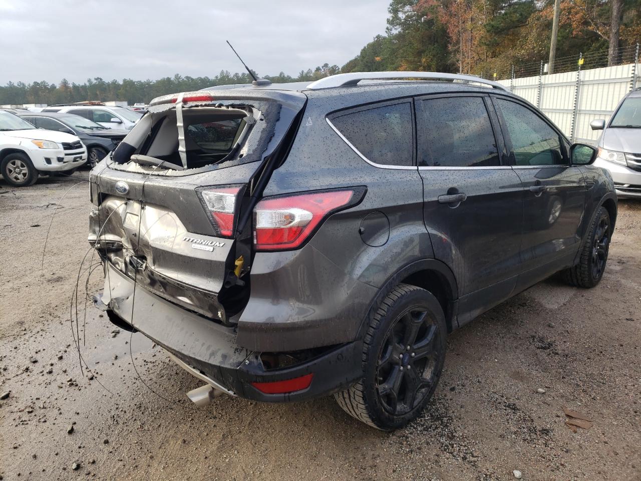 Photo 4 from auction – 2017 FORD ESCAPE TIT with VIN 1FMCU0J96HUD93808