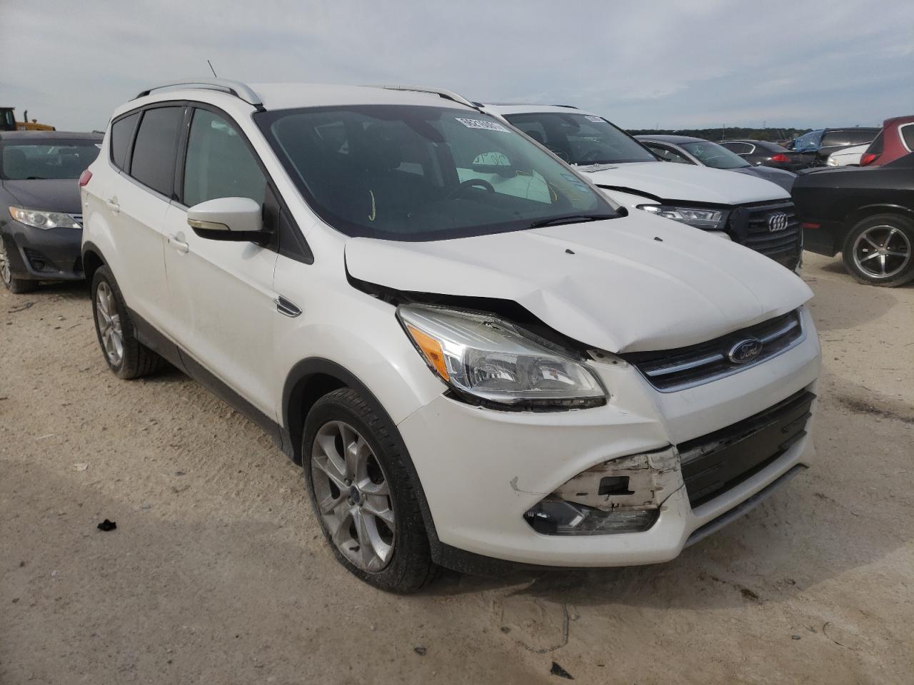 FORD ESCAPE TIT 2014 with VIN 1FMCU0J9XEUB49767 - Photo from auction