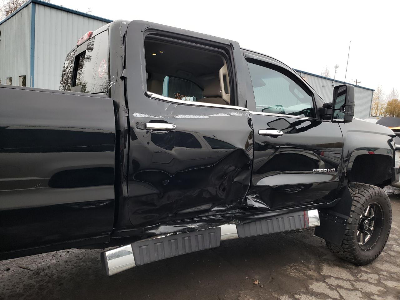 Photo 9 from auction – 2016 CHEVROLET SILVERADO with VIN 1GC4K0E82GF222847