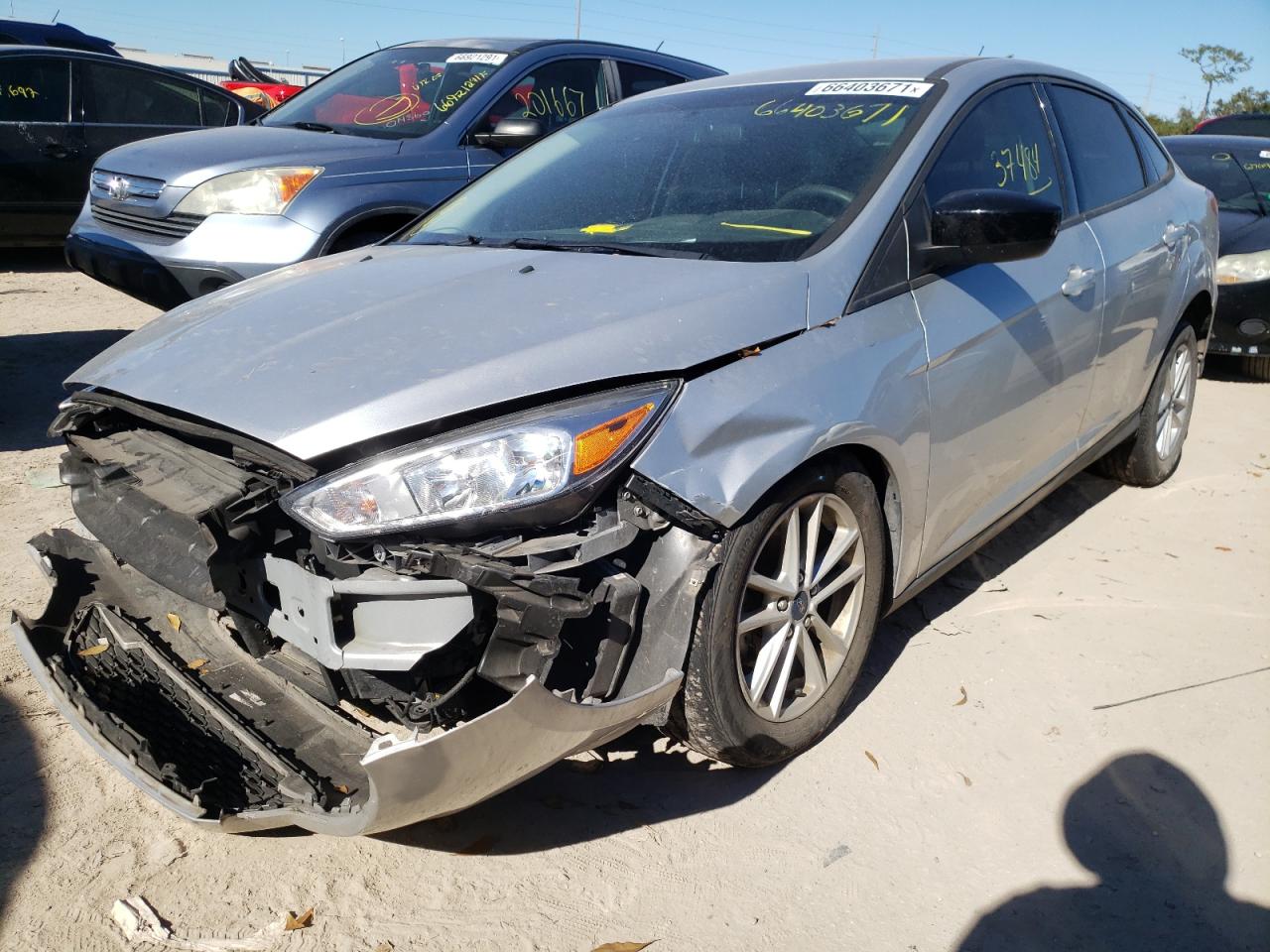 Photo 2 from auction – 2018 FORD FOCUS SE with VIN 1FADP3F27JL308294