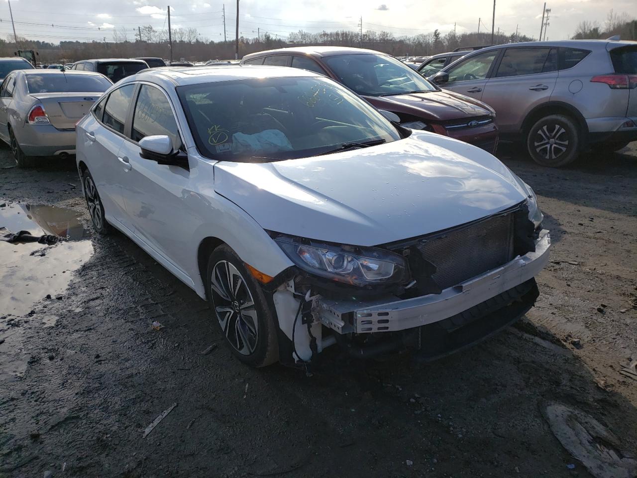 HONDA CIVIC EX 2016 with VIN 19XFC1F3XGE222765 - Photo from auction