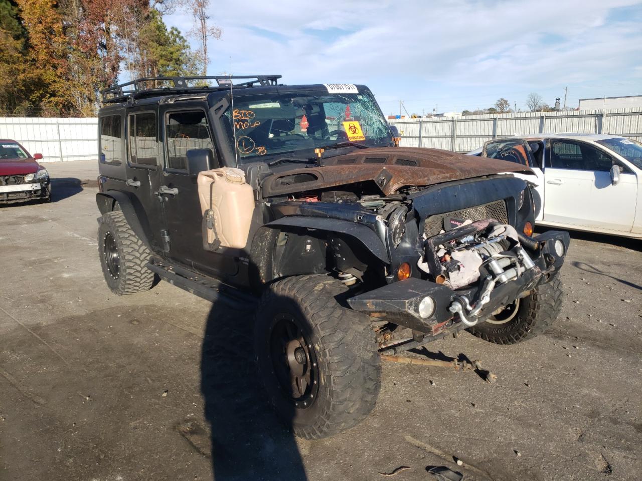 JEEP WRANGLER U 2011 con VIN 1J4BA3H11BL575255 - Foto de la subasta