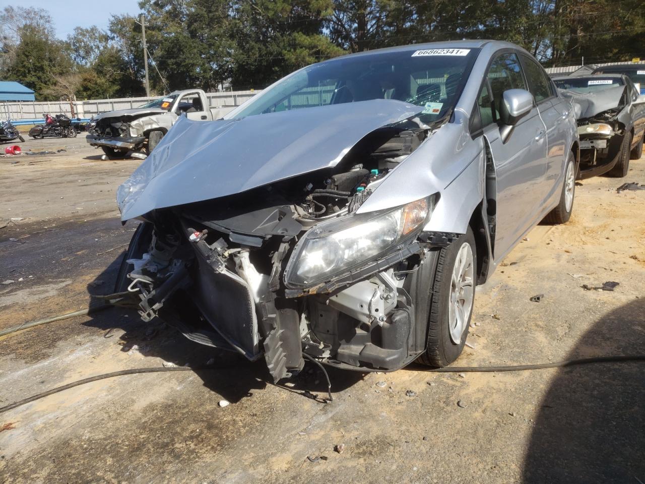 Photo 2 from auction – 2014 HONDA CIVIC LX with VIN 19XFB2F57EE030680