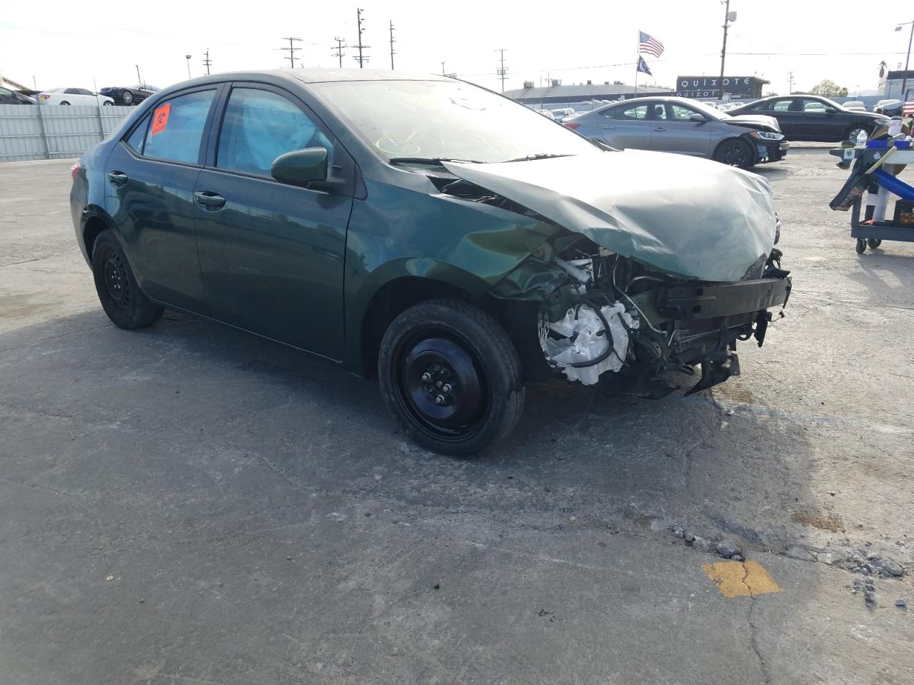 TOYOTA COROLLA L 2014 with VIN 5YFBURHE0EP069558 - Photo from auction