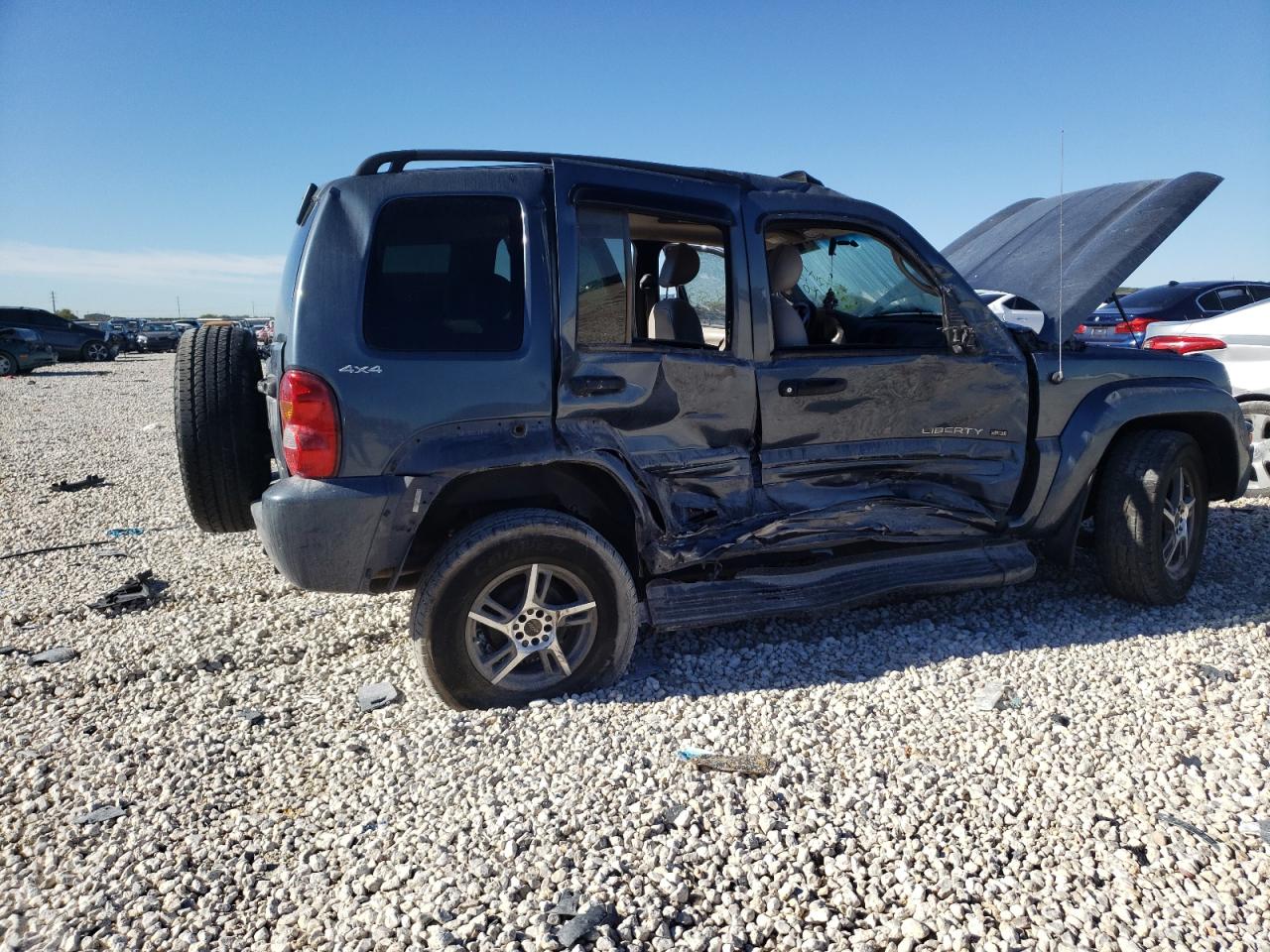 Photo 9 from auction – 2002 JEEP LIBERTY LI with VIN 1J8GL58K02W245785