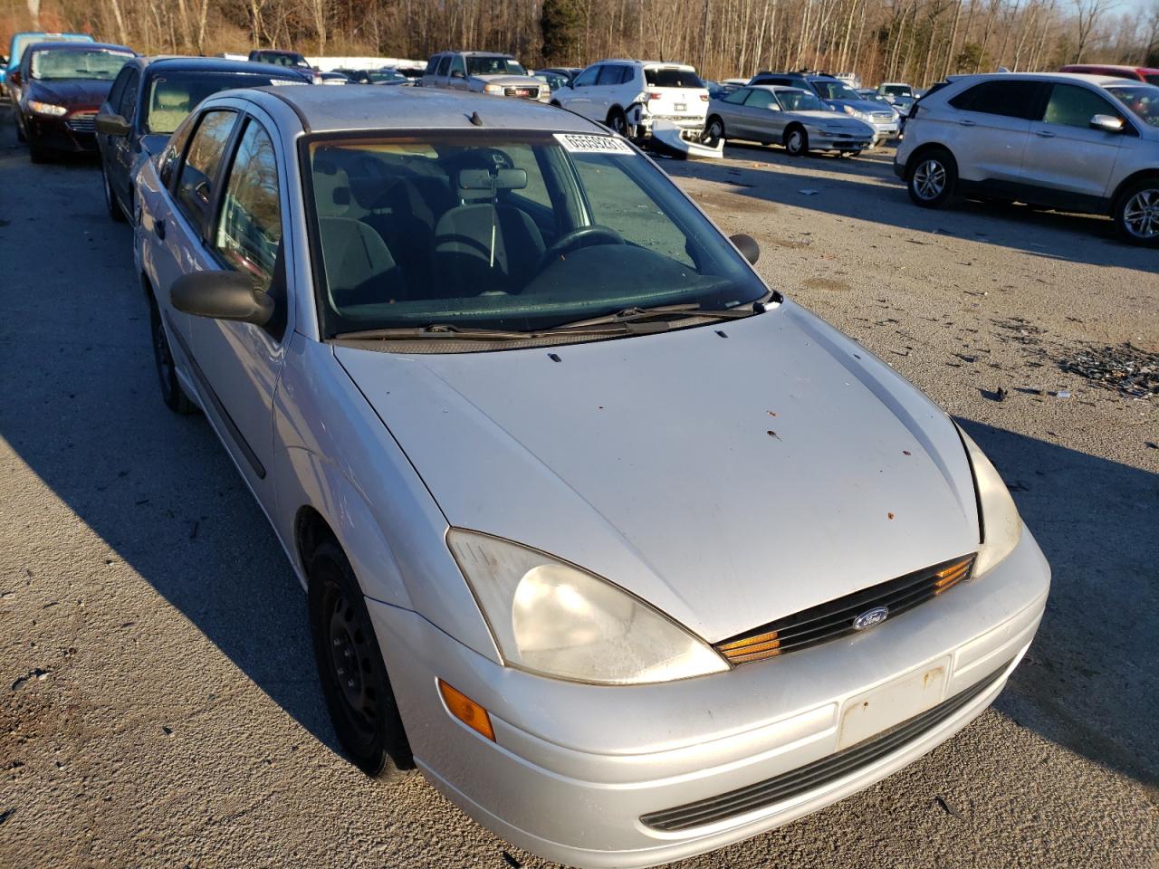 FORD FOCUS LX 2000 with VIN 1FAFP33P8YW352595 - Photo from auction