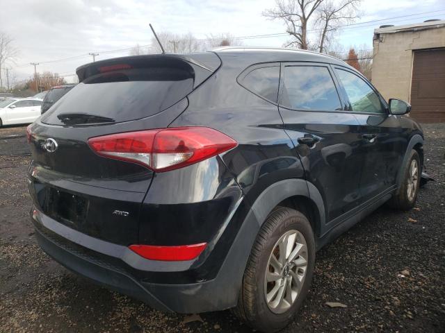 Photo 4 from auction – 2016 HYUNDAI TUCSON LIM with VIN KM8J3CA41GU098355