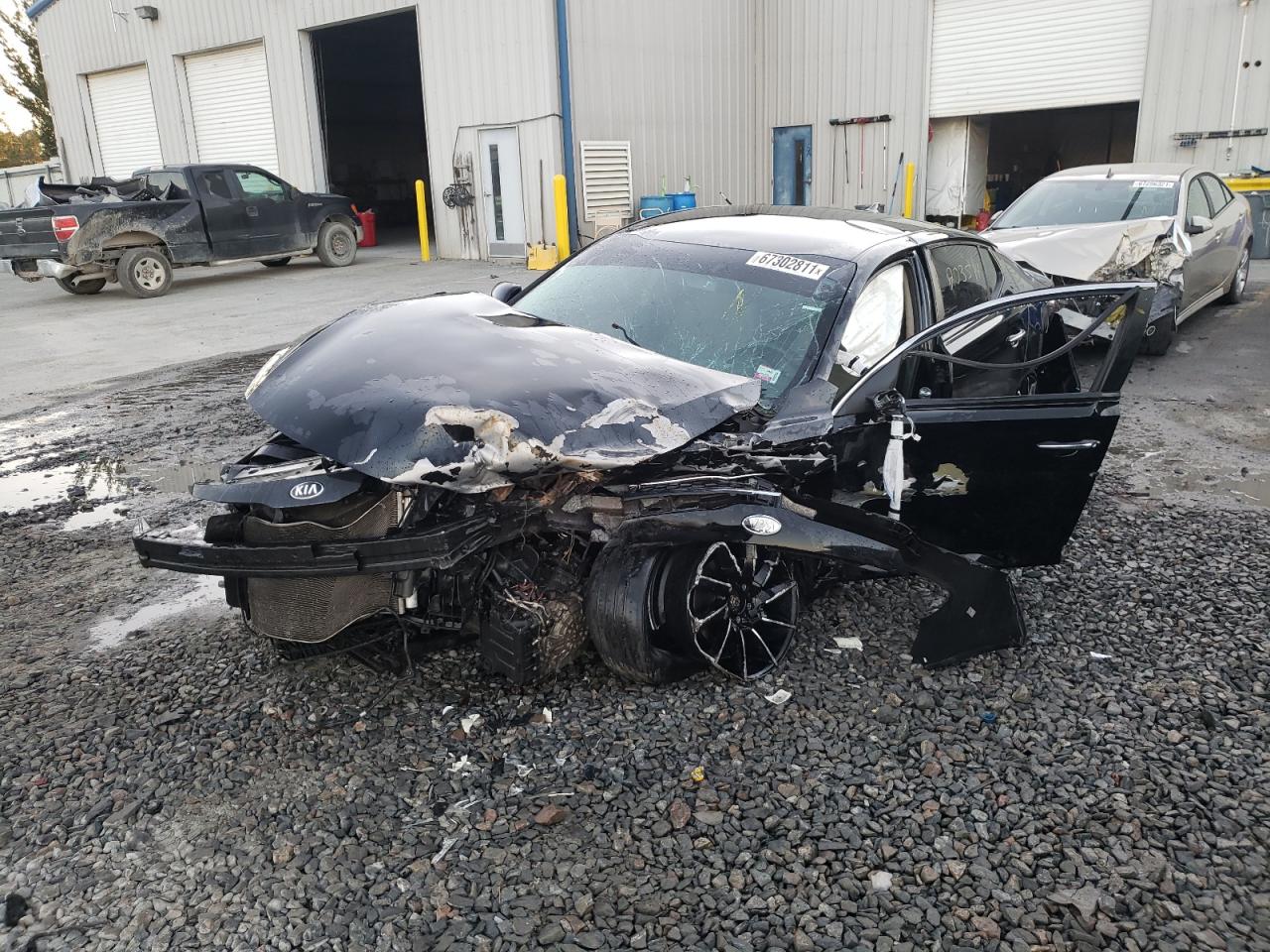 Photo 2 from auction – 2013 KIA OPTIMA LX with VIN 5XXGM4A75DG135825