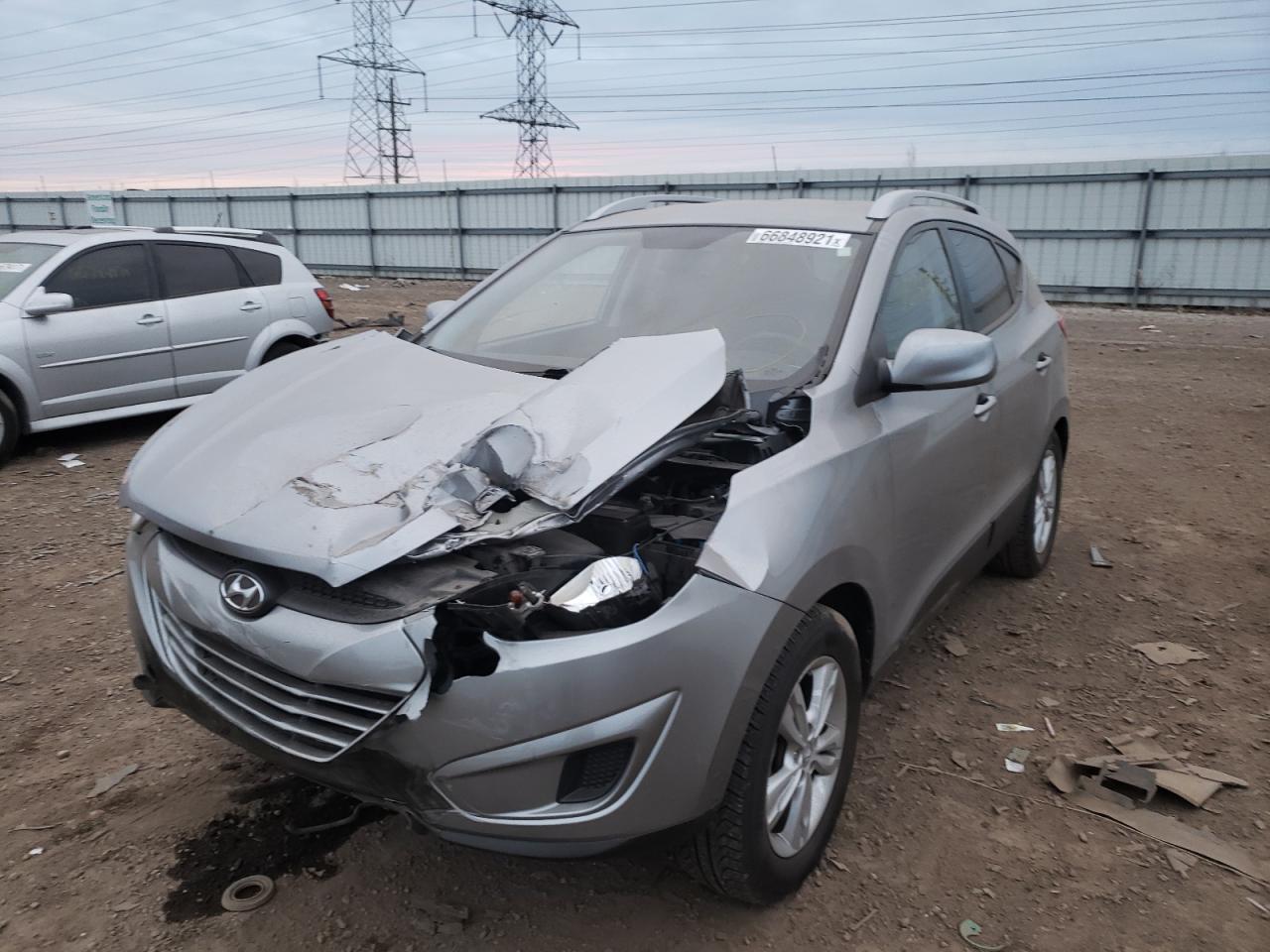 Photo 2 from auction – 2011 HYUNDAI TUCSON GLS with VIN KM8JU3AC4BU193697
