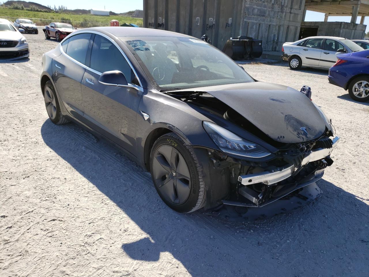 TESLA MODEL 3 2018 with VIN 5YJ3E1EB5JF183929 - Photo from auction