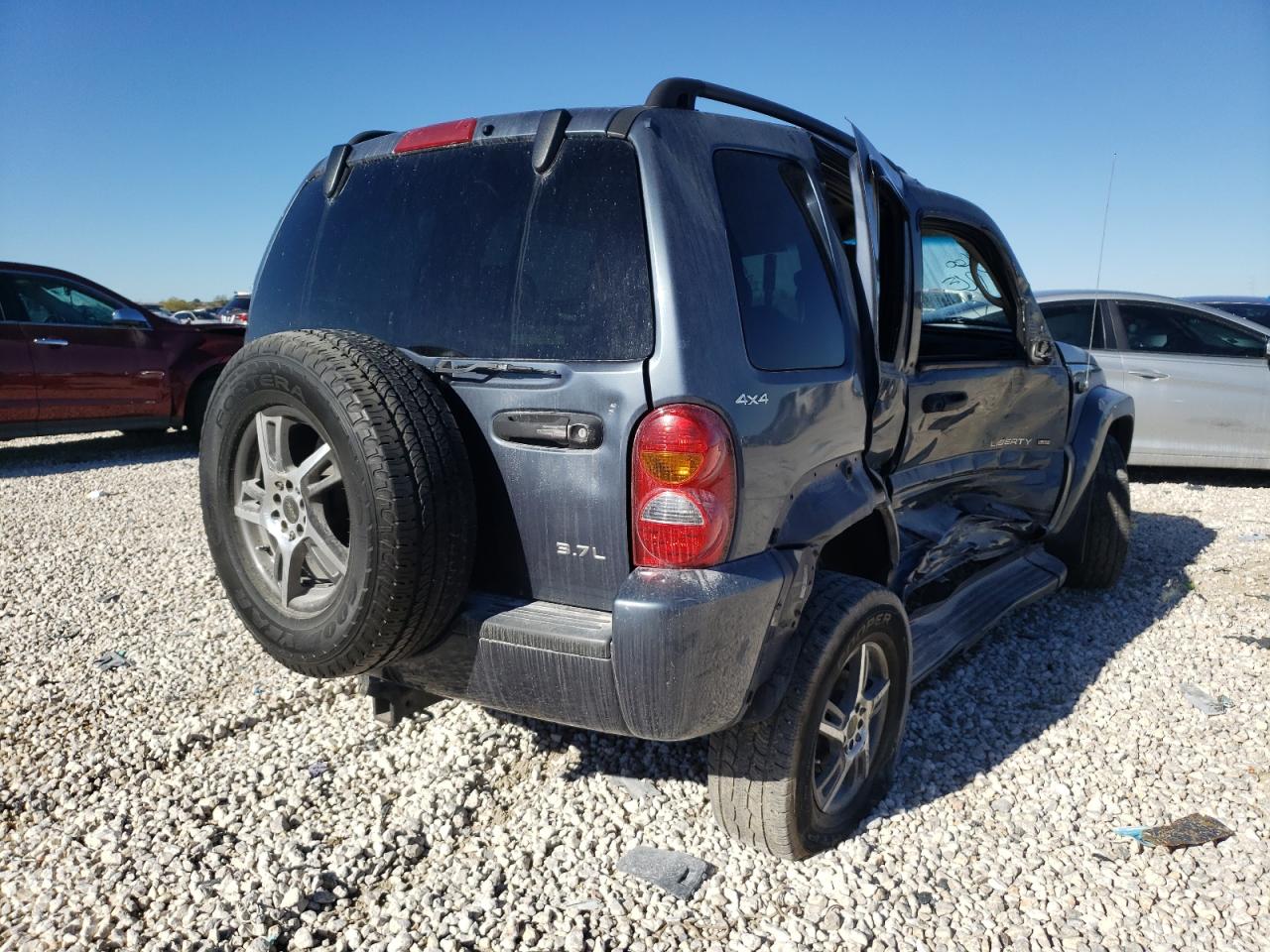 Photo 4 from auction – 2002 JEEP LIBERTY LI with VIN 1J8GL58K02W245785