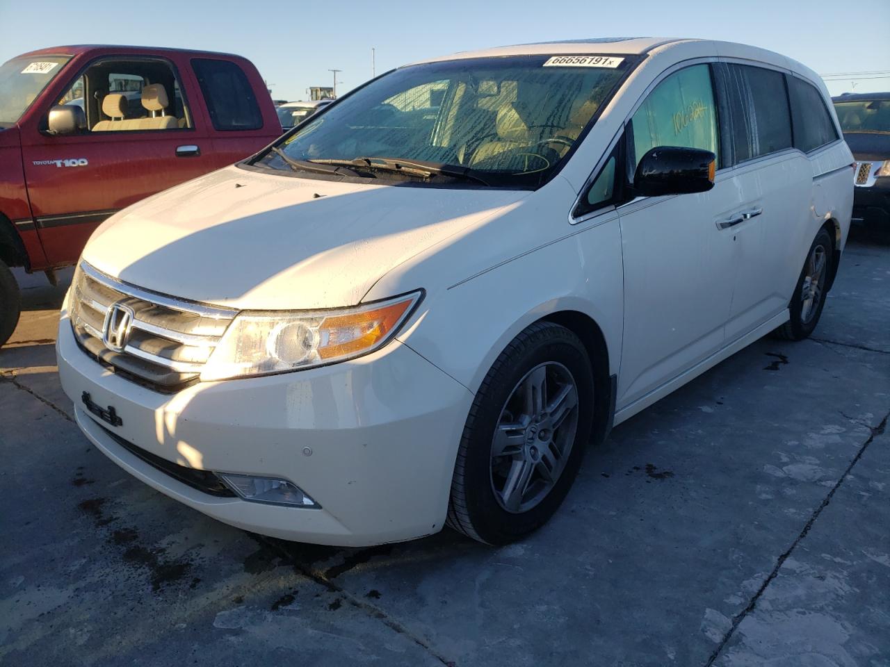 Photo 2 from auction – 2012 HONDA ODYSSEY TO with VIN 5FNRL5H95CB126326