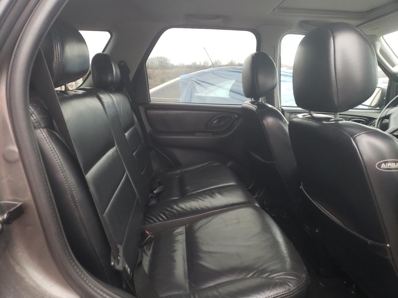 Photo 6 from auction – 2004 FORD ESCAPE LIM with VIN 1FMCU94124KA88841
