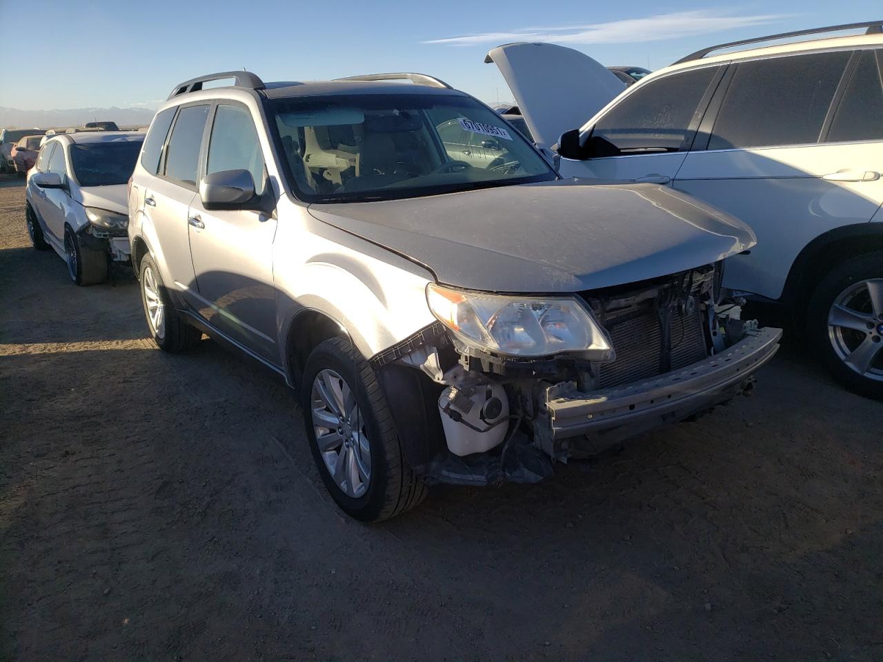 SUBARU FORESTER L 2011 with VIN JF2SHBEC7BH733572 - Photo from auction