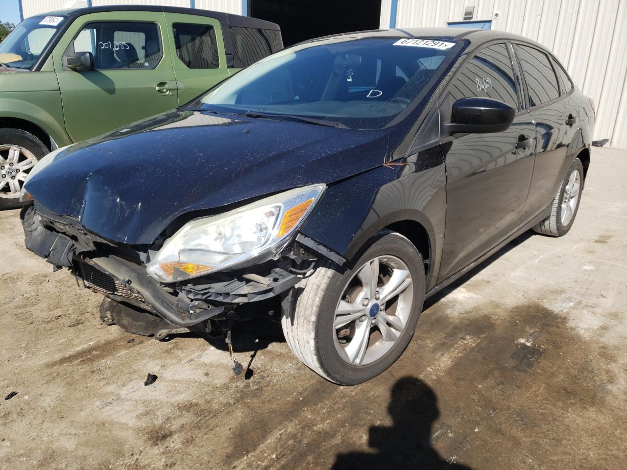 Photo 2 from auction – 2012 FORD FOCUS SE with VIN 1FAHP3F22CL412745