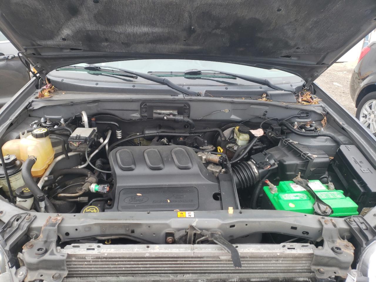Photo 7 from auction – 2004 FORD ESCAPE LIM with VIN 1FMCU94124KA88841