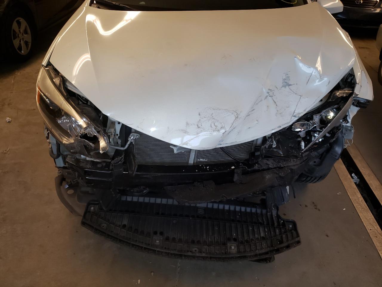 Photo 9 from auction – 2015 TOYOTA COROLLA EC with VIN 5YFBPRHE0FP358416
