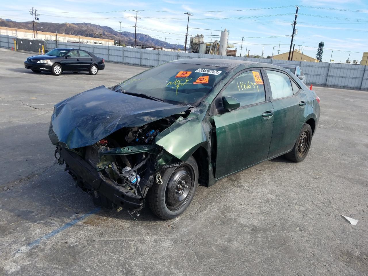 Photo 2 from auction – 2014 TOYOTA COROLLA L with VIN 5YFBURHE0EP069558