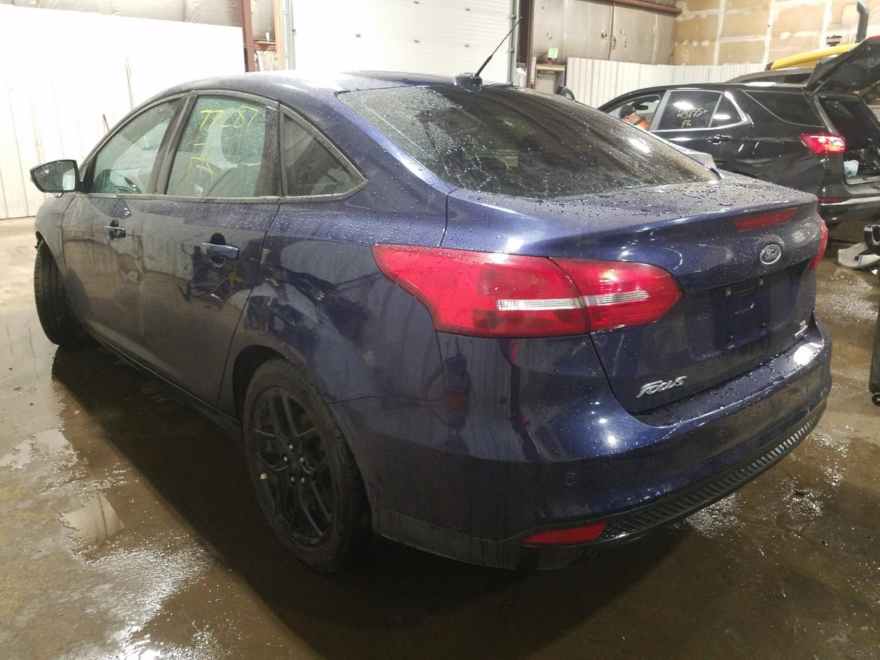 Photo 3 from auction – 2016 FORD FOCUS SE with VIN 1FADP3F2XGL311022