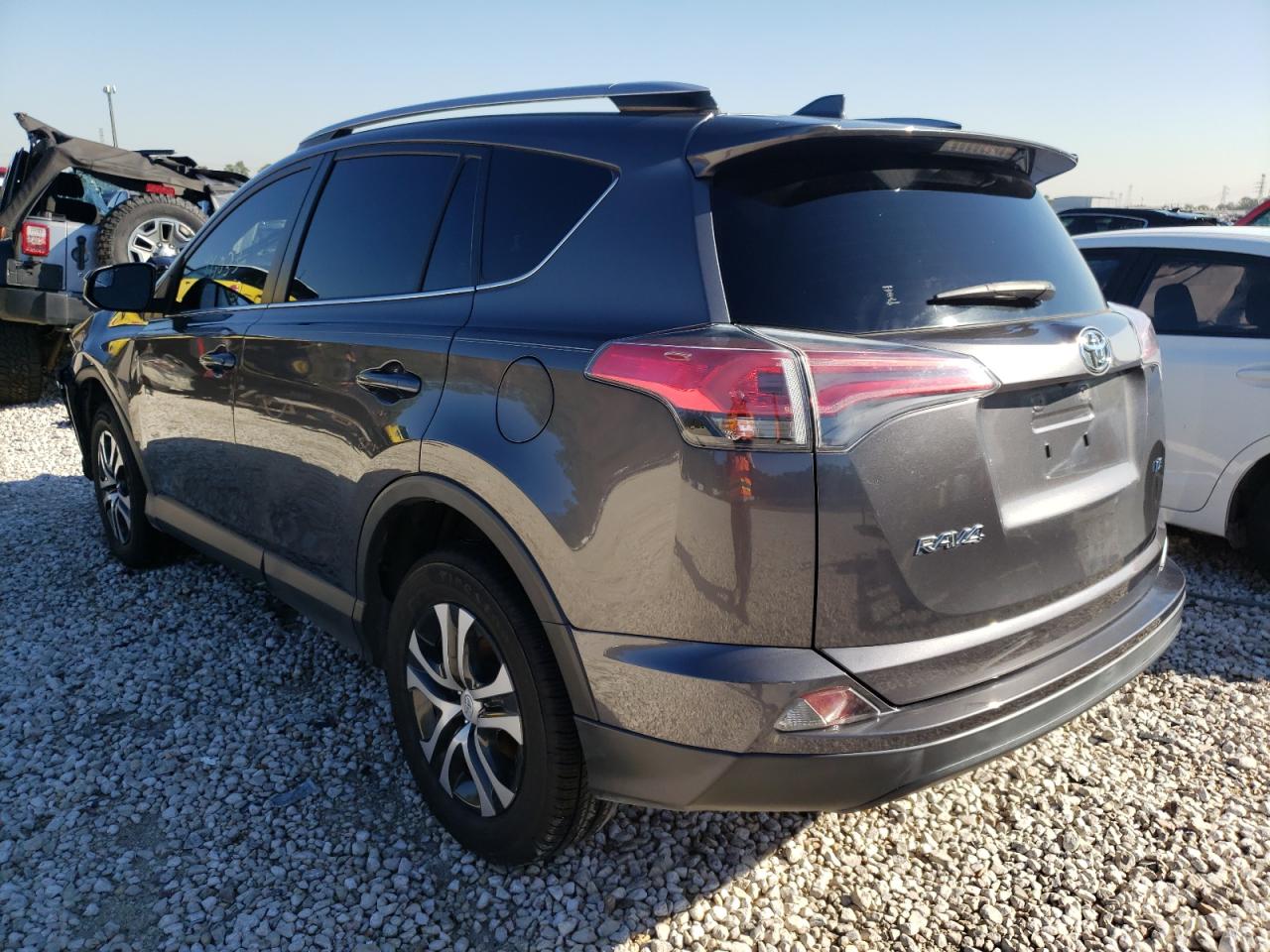 Photo 3 from auction – 2017 TOYOTA RAV4 LE with VIN JTMZFREV2HJ103974