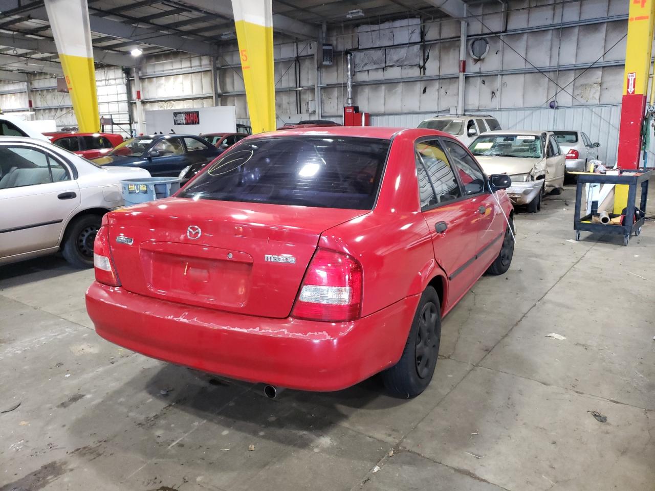 Photo 4 from auction – 1999 MAZDA PROTEGE ES with VIN JM1BJ2221X0140956