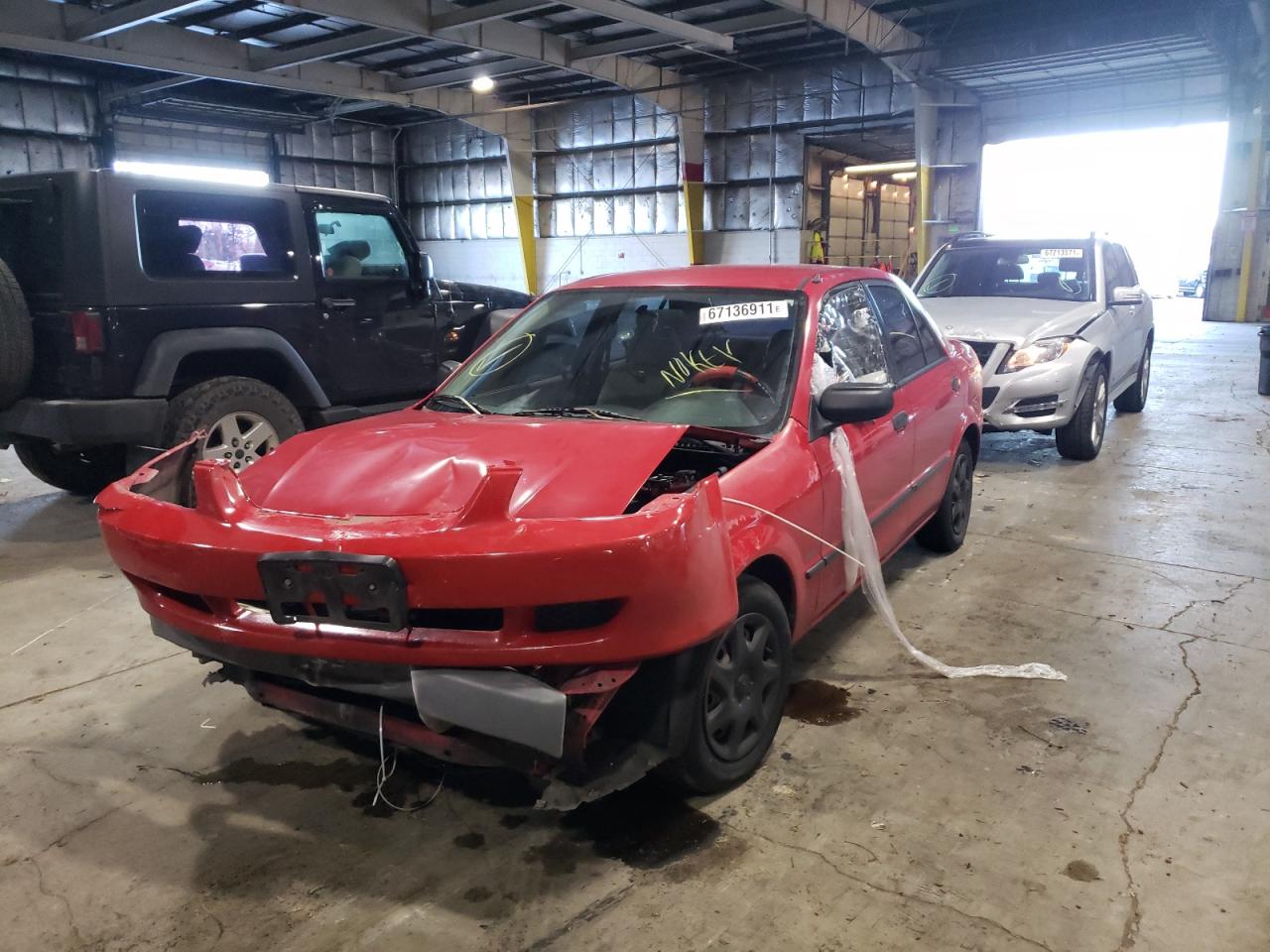Photo 2 from auction – 1999 MAZDA PROTEGE ES with VIN JM1BJ2221X0140956