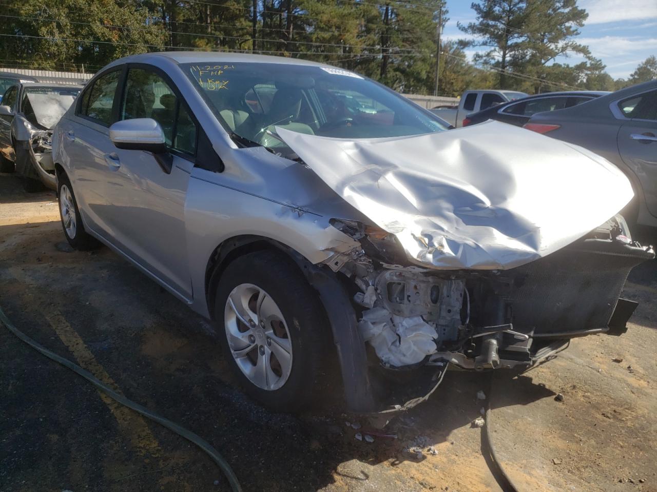 HONDA CIVIC LX 2014 with VIN 19XFB2F57EE030680 - Photo from auction