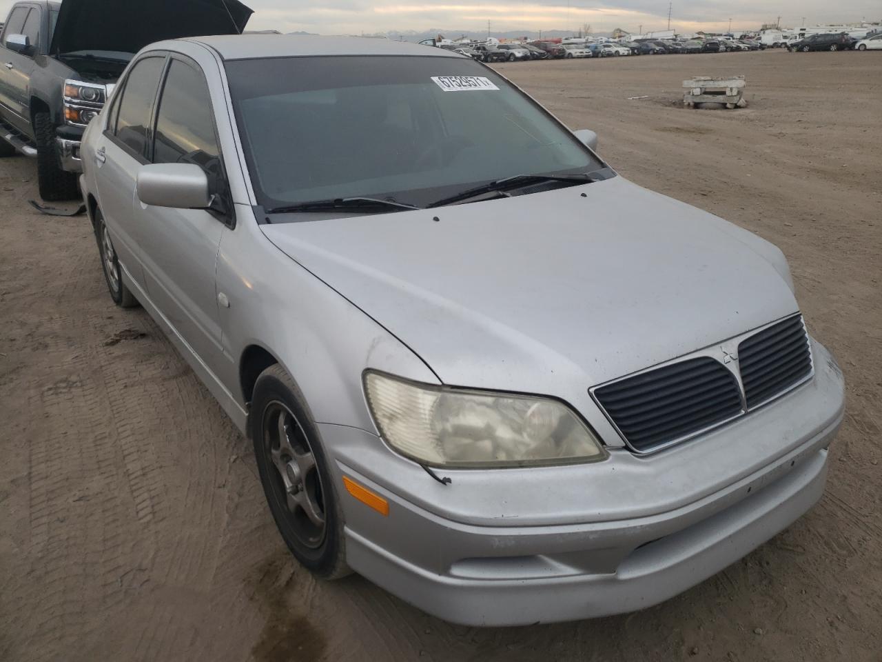 MITSUBISHI LANCER OZ 2002 with VIN JA3AJ86E12U010307 - Photo from auction