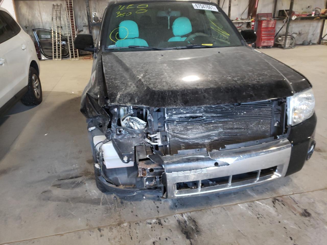 Photo 9 from auction – 2012 FORD ESCAPE LIM with VIN 1FMCU0E76CKB82959