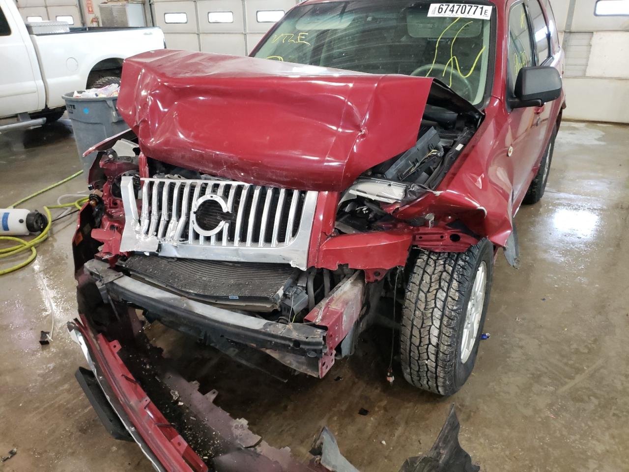 Photo 9 from auction – 2008 MERCURY MARINER with VIN 4M2CU91108KJ19948