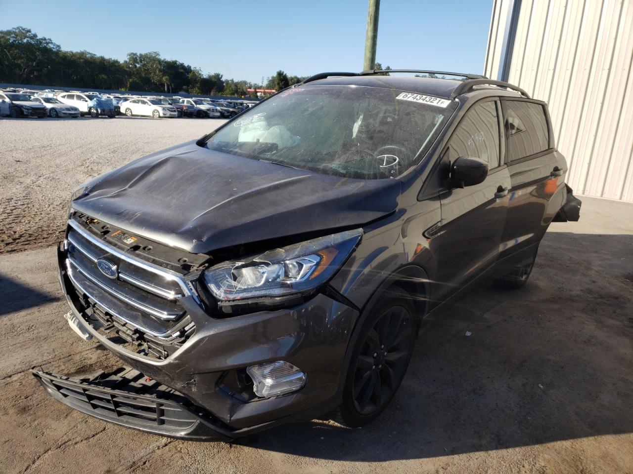 Photo 2 from auction – 2018 FORD ESCAPE SE with VIN 1FMCU0GD2JUA02199