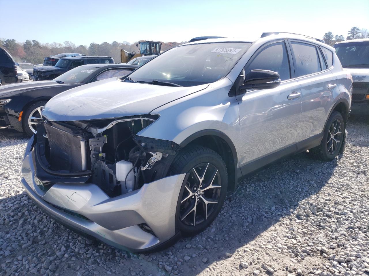 Photo 2 from auction – 2018 TOYOTA RAV4 SE with VIN JTMNFREV9JJ167563