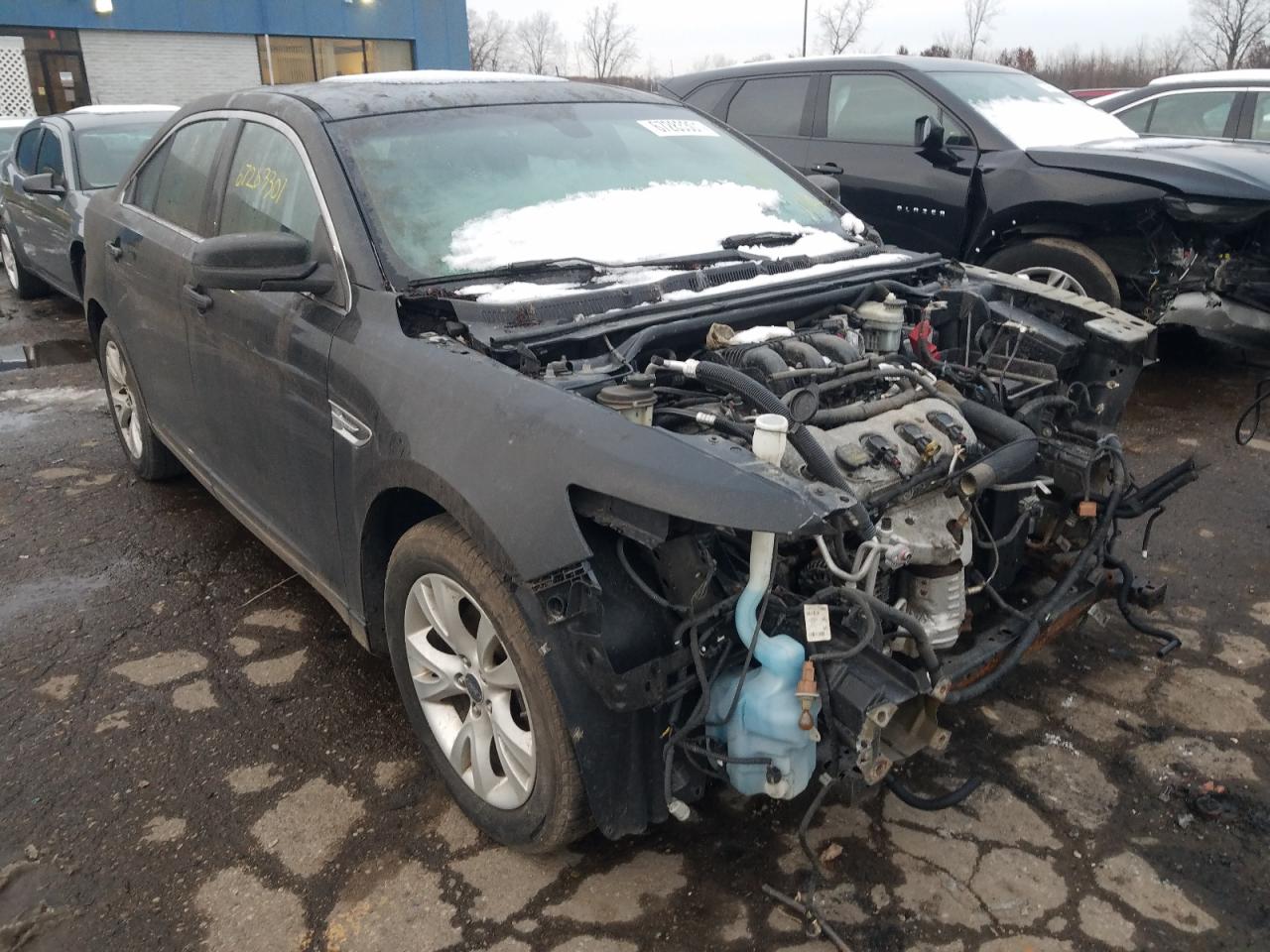 FORD TAURUS SEL 2012 with VIN 1FAHP2EW0CG119658 - Photo from auction