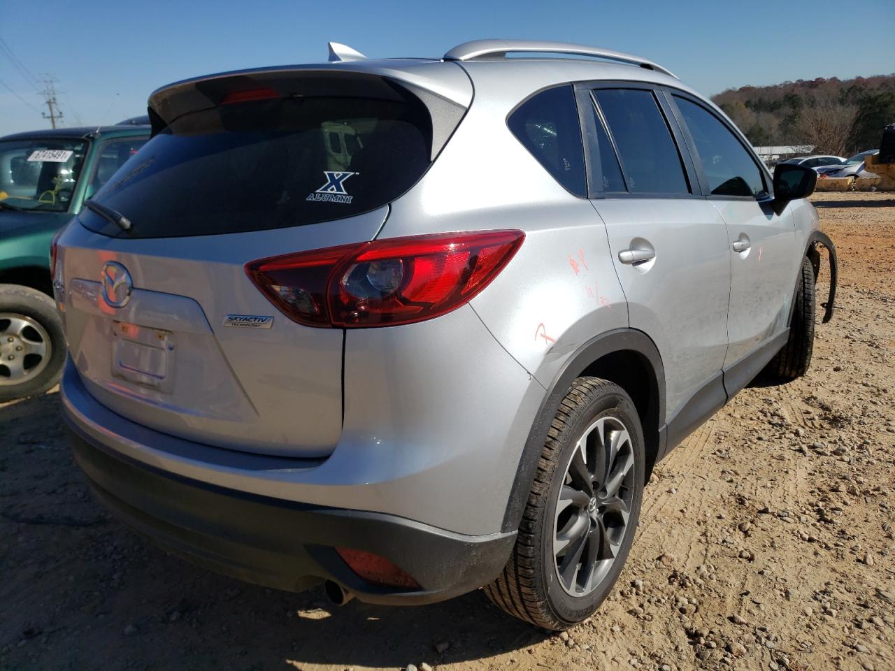 Photo 4 from auction – 2016 MAZDA CX-5 GT with VIN JM3KE2DYXG0899361