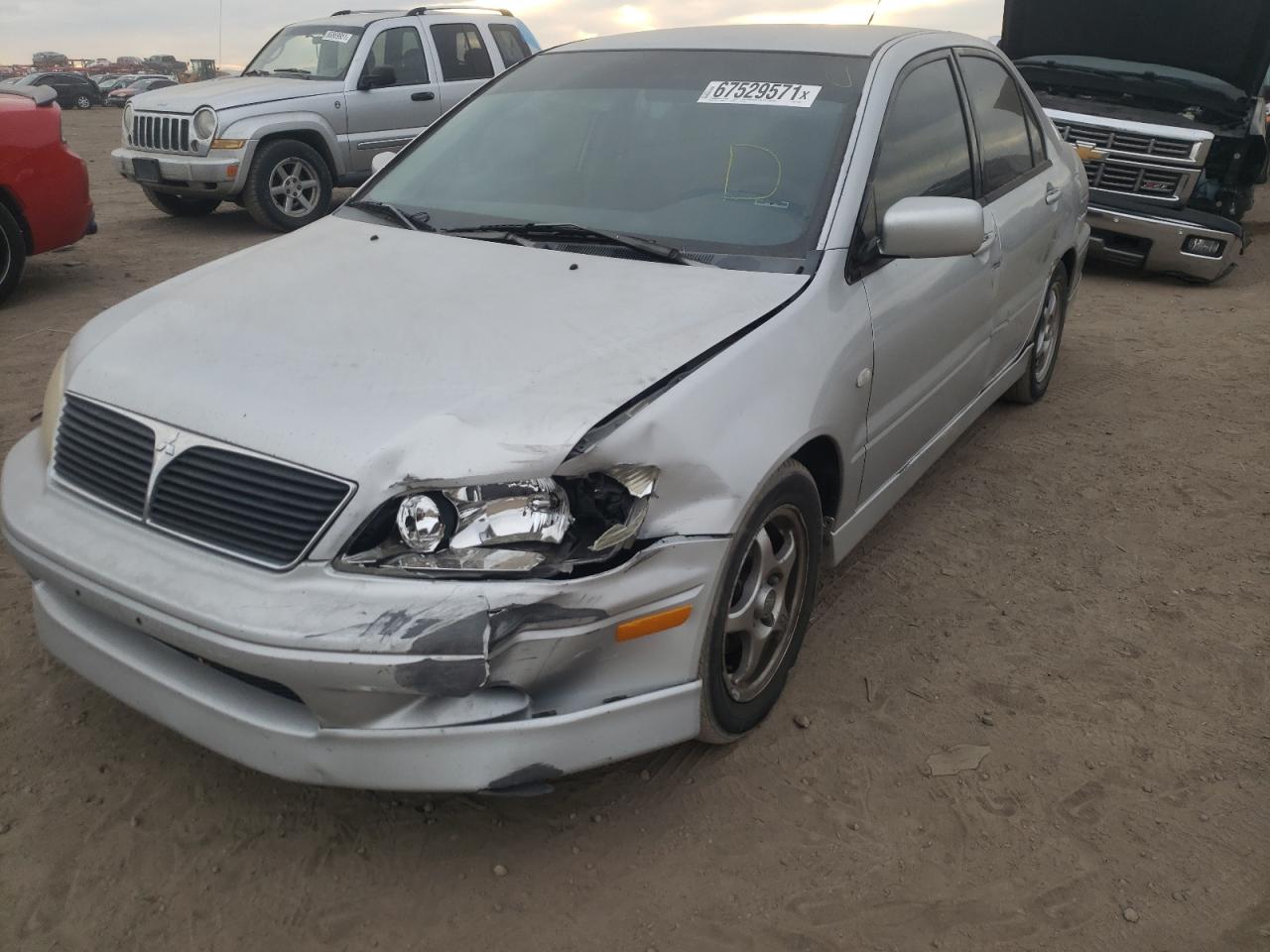 Photo 2 from auction – 2002 MITSUBISHI LANCER OZ with VIN JA3AJ86E12U010307