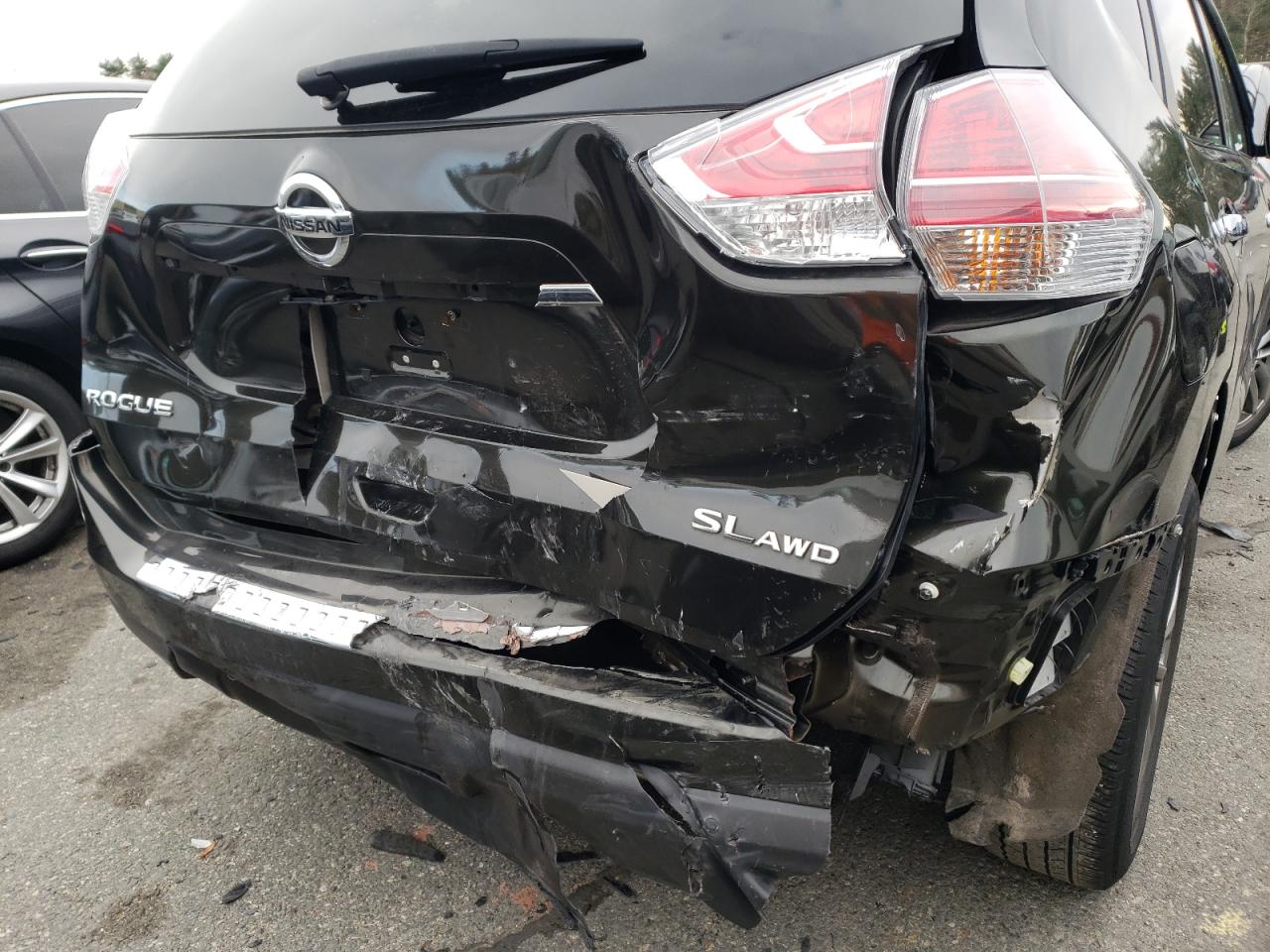 Photo 9 from auction – 2015 NISSAN ROGUE S with VIN 5N1AT2MV1FC829692