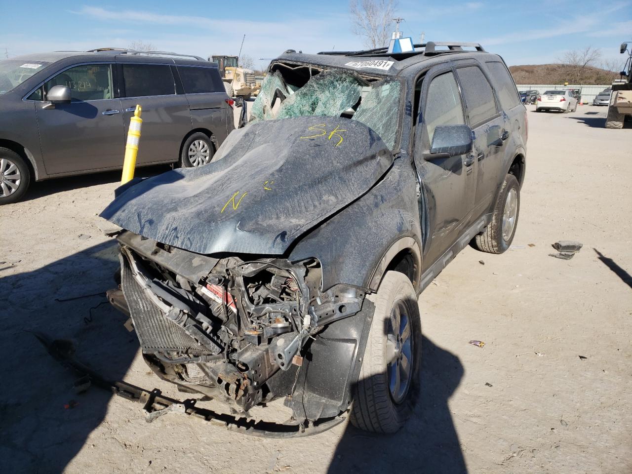 Photo 2 from auction – 2010 FORD ESCAPE LIM with VIN 1FMCU0EG2AKC88595