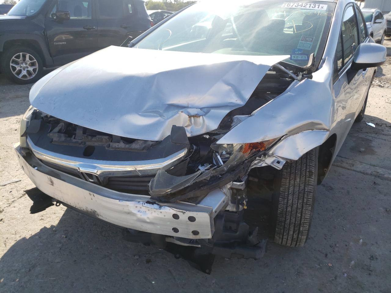 Photo 9 from auction – 2012 HONDA CIVIC LX with VIN 19XFB2F57CE352460