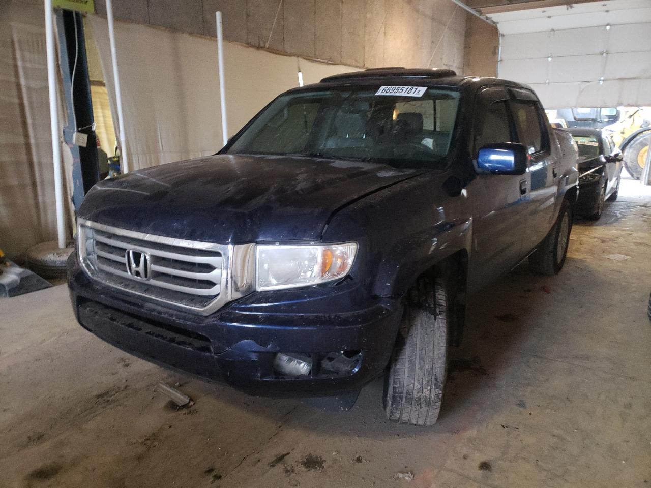 Photo 2 from auction – 2013 HONDA RIDGELINE with VIN 5FPYK1F57DB010755