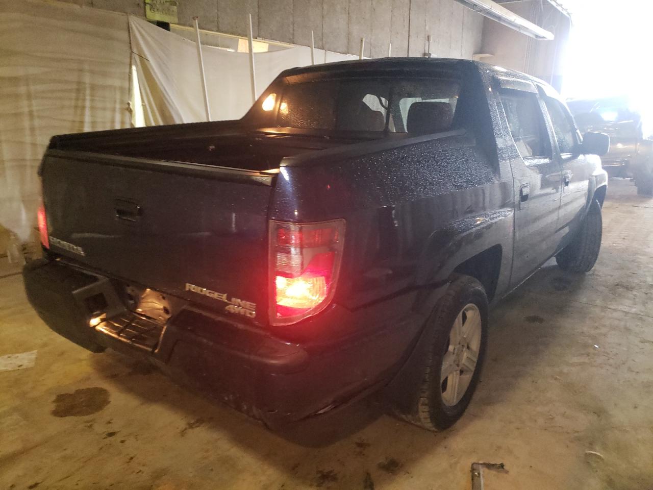 Photo 4 from auction – 2013 HONDA RIDGELINE with VIN 5FPYK1F57DB010755