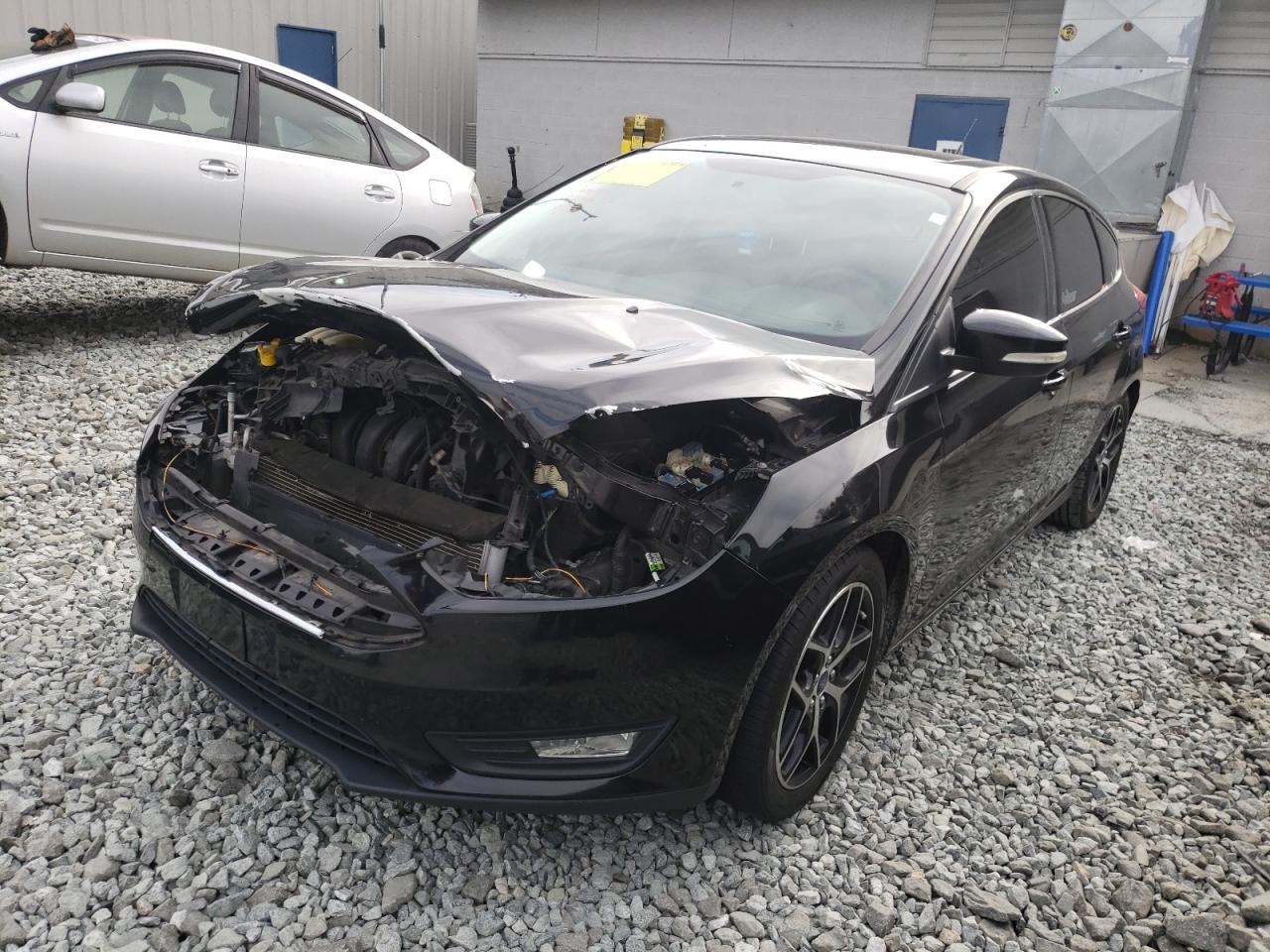 Photo 2 from auction – 2017 FORD FOCUS SEL with VIN 1FADP3M26HL248098