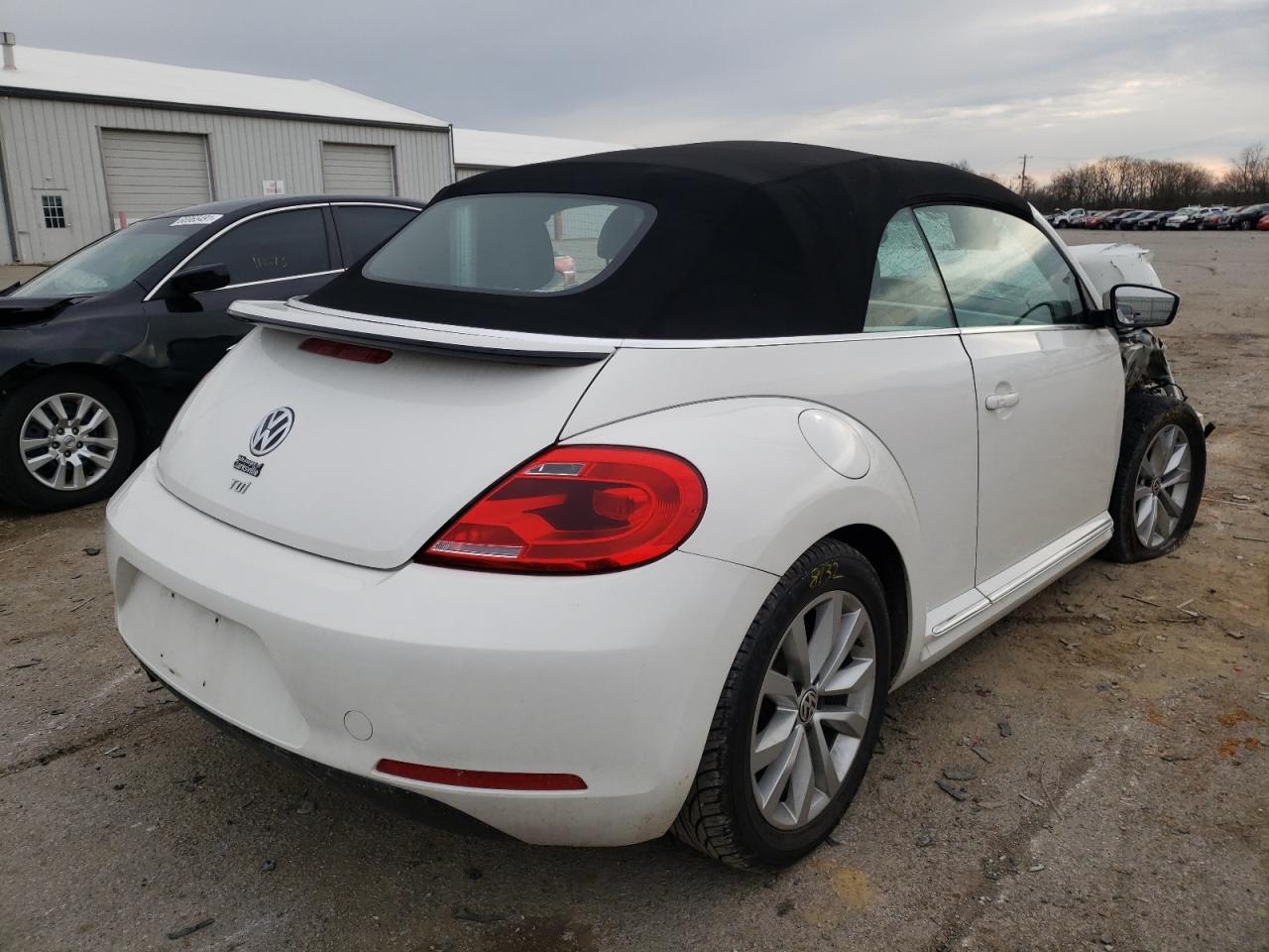 Photo 4 from auction – 2014 VOLKSWAGEN BEETLE with VIN 3VW5L7AT6EM805730