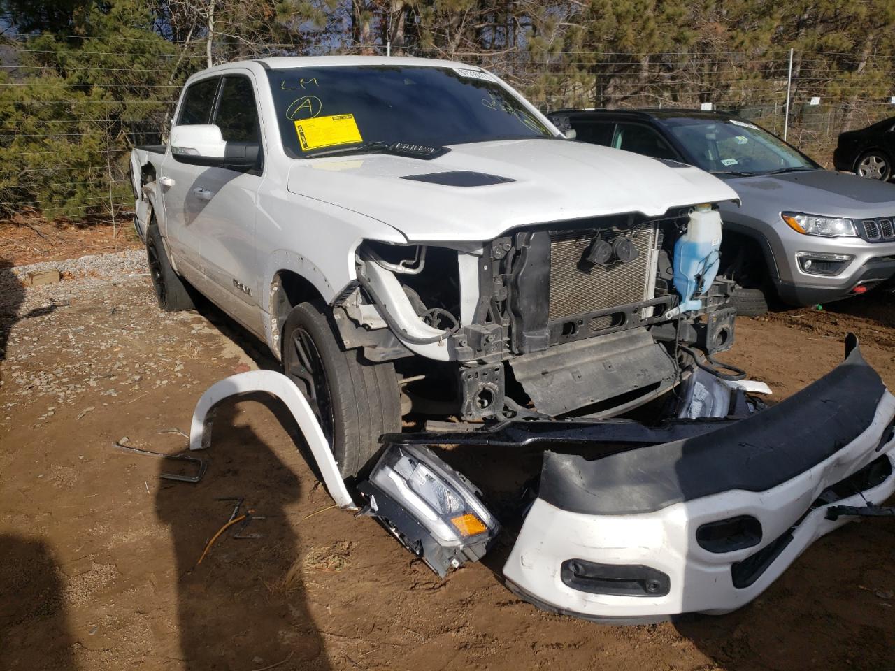 RAM 1500 LARAM 2019 with VIN 1C6SRFJT3KN907588 - Photo from auction