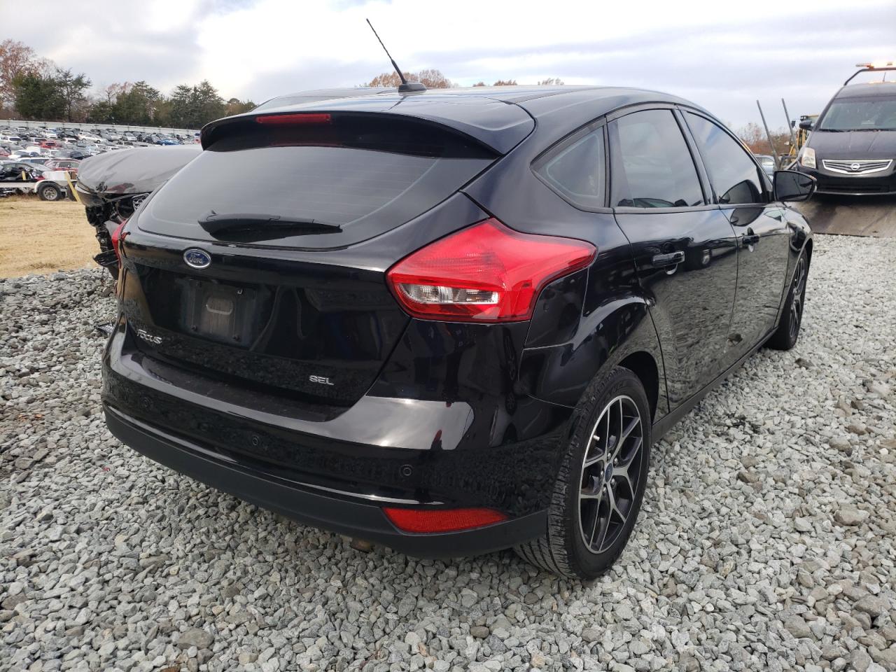 Photo 4 from auction – 2017 FORD FOCUS SEL with VIN 1FADP3M26HL248098