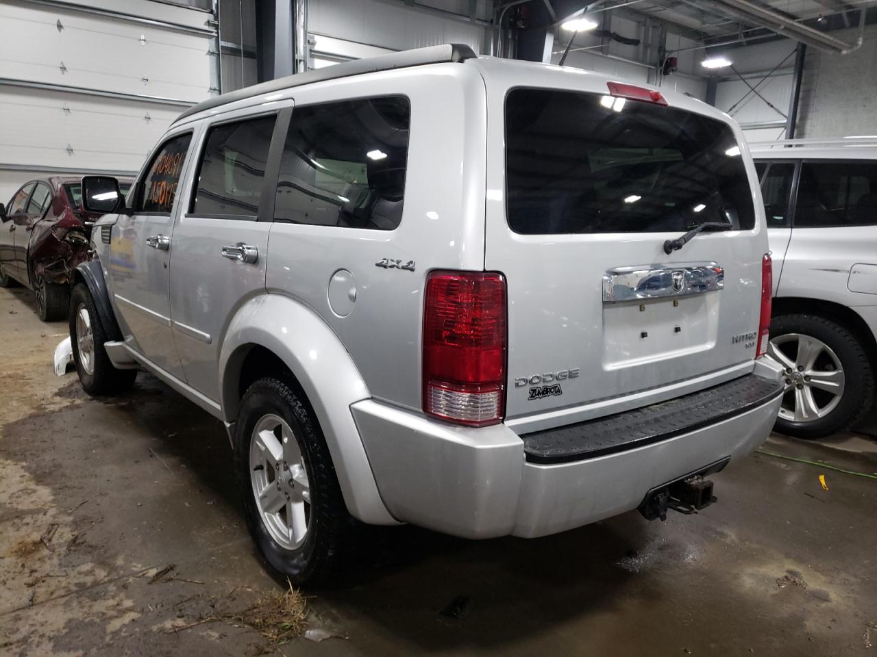 Photo 3 from auction – 2010 DODGE NITRO SXT with VIN 1D4PU5GK9AW134336