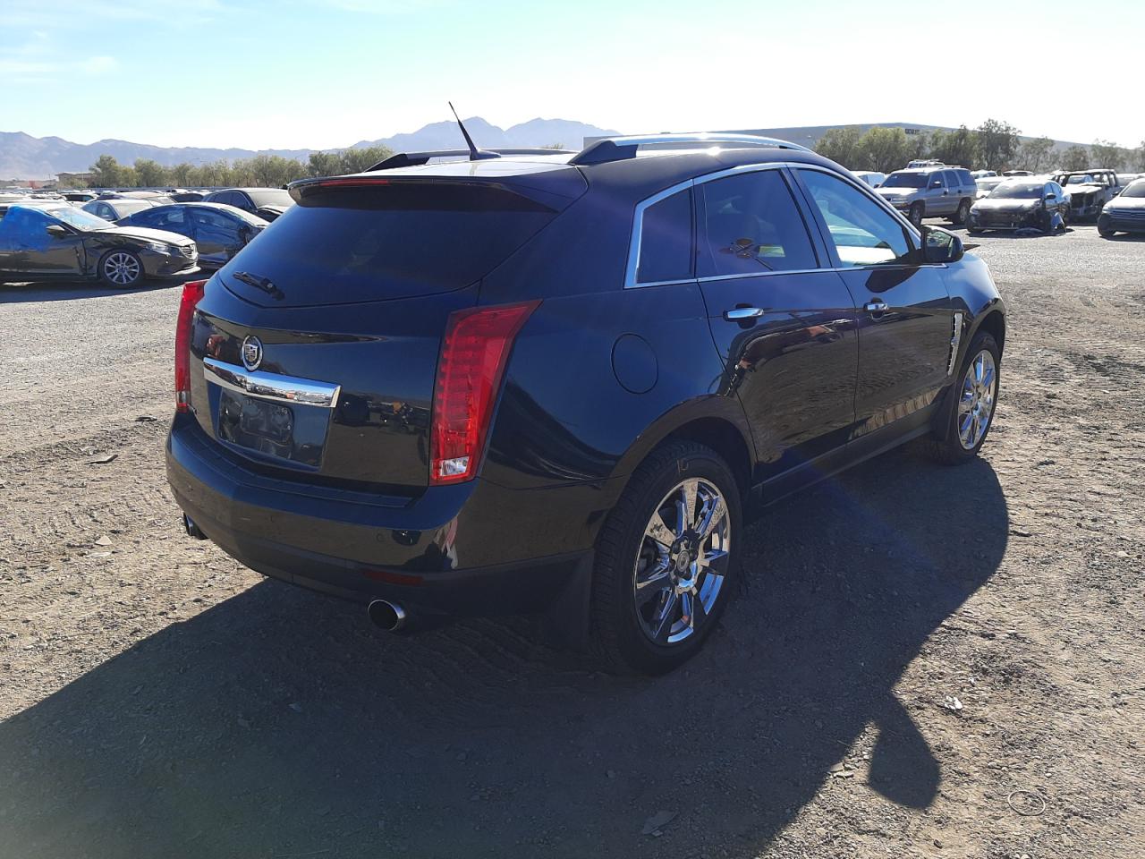 Photo 4 from auction – 2011 CADILLAC SRX PERFOR with VIN 3GYFNBEYXBS648201