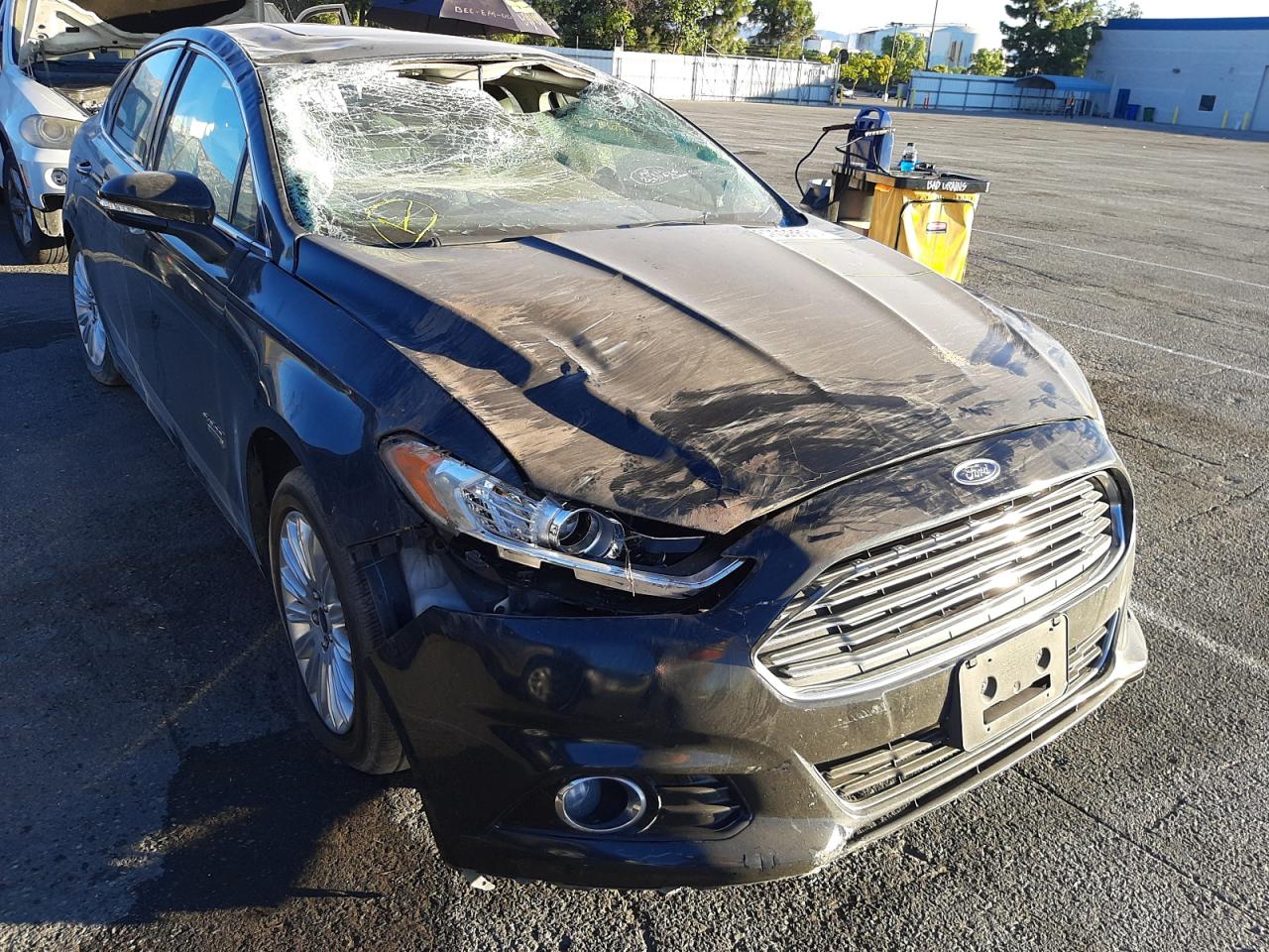 FORD FUSION TIT 2014 with VIN 3FA6P0SU2ER186045 - Photo from auction